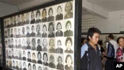 FILE - Cambodian villagers tour the Tuol Sleng genocide museum, former Khmer Rouge S-21 prison, in Phnom Penh, Cambodia. (AP Photo)