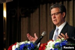 FILE - Sam Brownback, U.S. ambassador for religious freedom, speaks during "A Civil Society Dialogue on Securing Religious Freedom in the Indo-Pacific Region" forum in Taipei, Taiwan, March 11, 2019.