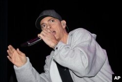 Eminem performs at the Sound Board theater located inside the MotorCity Casino, Hotel in Detroit, May 19, 2009.