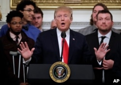 President Donald Trump speaks in the State Dining Room of the White House in Washington, March 4, 2019.