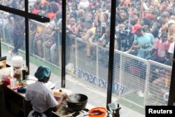 Nigerian Chef Hilda Baci, 27, attempts to break the Guinness World Record for the longest cooking time by an individual, in Lagos, Nigeria May 15, 2023. (REUTERS/Temilade Adelaja)