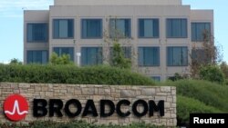 A sign to the campus offices of chipmaker Broadcom Ltd, who announced on Monday an unsolicited bid to buy peer Qualcomm Inc for $103 billion, is shown in Irvine, California, Nov. 6, 2017. 