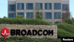 FILE - A sign to the campus offices of chipmaker Broadcom Ltd is shown in Irvine, California, Nov. 6, 2017. 