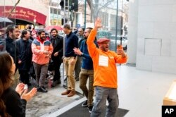 Mohamed Jawad enters a Palo Alto, Calif, Apple store to purchase a Vision Pro headset on the first day of sales on Friday, Feb. 2, 2024. (AP Photo/Noah Berger)