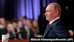 Putin speaks during his annual news conference in Moscow, December 14, 2017.