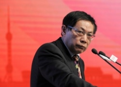 FILE - Ren Zhiqiang, the former chairman of state-owned property developer Huayuan Group, speaks at the China Public Welfare Forum in Beijing, Nov. 18, 2013.