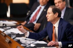 Senate Intelligence Committee member Sen. Ron Wyden, D-Ore. questions CIA Director John Brennan on Capitol Hill in Washington, Feb. 9, 2016.
