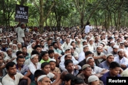 Rohingya refugees take part in a protest at the Kutupalong refugee camp to mark the one-year anniversary of their exodus from Myanmar, in Cox's Bazar, Bangladesh, Aug. 25, 2018.