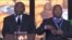Mandela sign interpreter, Thamsanqa Jantjie (r)