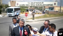 Philip Kosnett, the U.S. Embassy Charge d'Affaires, talks to members of the media after attending the trial of jailed US pastor Andrew Craig Brunson at a court inside the prison complex in Aliaga, Izmir province Wednesday, July 18, 2018.