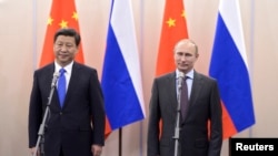 中国国家主席习近平和俄罗斯总统普京（2014年2月6日资料照片）