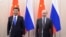 Tổng thống Nga Vladimir Putin (phải) và Chủ tịch Trung Quốc Tập Cận Bình