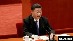 រូបឯកសារ៖ ប្រធានាធិបតីចិនលោក Xi Jinping ថ្លែង​ក្នុង​កិច្ចប្រជុំ​គម្រប់ខួបទី១១០ នៃបដិវត្តន៍ Xinhai នៅទីក្រុង​ប៉េកាំង ប្រទេសចិន​កាលពីថ្ងៃទី៩ ខែតុលា ឆ្នាំ២០២១។ (Reuters)