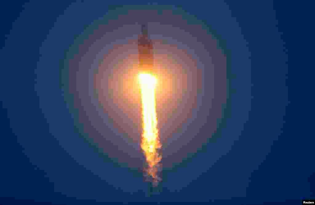 The Delta IV Heavy rocket with the Orion spacecraft lifts off from the Cape Canaveral Air Force Station, Dec. 5, 2014.