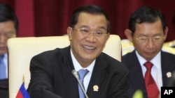 Cambodian Prime Minister Hun Sen spoke to the lower house of parliament in a nationally televised speech Thursday, Aug. 9, 2012, that was mandatory viewing for civil servants.