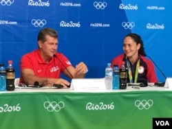 Coach Geno Auriemo and Sue Bird, captain of the U.S. women's Olympic basketball team, speak with reporters in Rio de Janeiro, Brazil, Aug. 20, 2016. (P. Brewer/VOA)