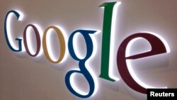 A Google sign is seen at a Best Buy electronics store in Encinitas, California, Apr. 11, 2013.