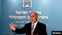Israel's Prime Minister Benjamin Netanyahu speaks during a news conference at his office in Jerusalem, December 2, 2014.