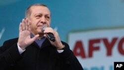 Le président turc Recep Tayyip Erdogan, lors d'un rassemblement dans la province d'Afyonkarahisar, dans l'ouest de la Turquie, le mercredi 15 mars 2017.