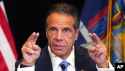 FILE - New York Gov. Andrew Cuomo speaks during a news conference at New York's Yankee Stadium, July 26, 2021.