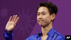FILE - Figure skater Denis Ten, of Kazakhstan, reacts as his score is posted following his performance in the men's short program figure skating, in the Gangneung Ice Arena at the 2018 Winter Olympics in Gangneung, South Korea, Feb. 16, 2018.