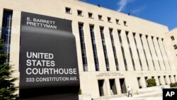 FILE - A view of the E. Barrett Prettyman U.S. Courthouse in Washington. U.S. District Judge Tanya Chutkan says she won't recuse herself from Donald Trump's 2020 election interference case. 