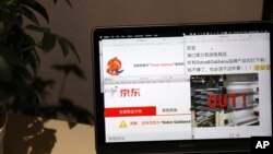 A computer screen shows the online impact on Dolce & Gabbana products displayed in Beijing, China, Nov. 22, 2018. 