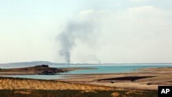 His cheek wet with tears, President Barack Obama President Barack Obama recalls the 20 first-graders killed in 2012 at Sandy Hook Elementary School, while speaking in the East Room of the White House in Washington about steps his administration is taking to reduce gun violence.