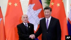 ​​ព្រះ​ករុណា​ព្រះ​បាទ​សម្តេច​ព្រះ​បរមនាថ​នរោត្តម​សីហមុនី​ ជួប​សវនាការ​ជាមួយ​លោក ស៊ី ជីនពីង ប្រធានាធិបតី​ចិន នៅ​វិមាន​ប្រជា​ជន​ចិន ក្នុង​ទីក្រុង​ប៉េកាំង ប្រទេស​ចិន កាល​ពី​ថ្ងៃ​ទី​១៤ ឧសភា ២០១៩។