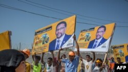 Supporters hold banners of candidates during a rally of the opposition Waddani Party for Somaliland’s elections in Hargeisa, the capital of the self-declared republic of Somaliland in northern Somalia, May 25, 2021.