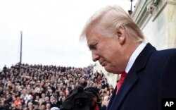 President-elect Donald Trump arrives for his presidential inauguration on Capitol Hill in Washington, Jan. 20, 2017.