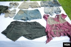 Remaining textiles of Toul Sleng victims are shown during the signing off ceremony on the conservation of ethnographic objects at Toul Sleng Genocide Museum on 11th December, 2017. (Tum Malis/ VOA Khmer)