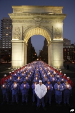 The Doe Fund participants and workers pose for the organization's annual Christmas card.