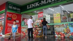 People visit a supermarket in Hanoi, Vietnam, Thursday, Feb. 21, 2019. (AP Photo/Minh Hoang)