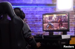 Competitors square off in a Tekken 7 tournament at Esports Arena in Los Angeles, Oct. 16, 2016.