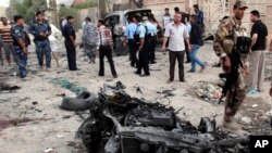 Serangan bom mobil di kawasan Syiah di Basra, Iraqk selatan hari Minggu (14/7).