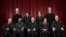 The justices of the U.S. Supreme Court gather for a formal group portrait at the Supreme Court Building in Washington, Nov. 30, 2018.