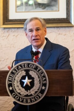 FILE - Texas Governor Greg Abbott speaks in Lubbock, Texas, March 2, 2021.