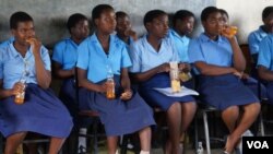 Malawi girls relax after a session at the Girls' Club in Mulanje, Malawi. (Photo: Lameck Masina for VOA) 