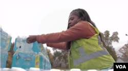 Free bottled water is available for residents of Flint, Michigan.