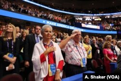 Delegates recite the Pledge of Allegiance as the last day of the Republican National Convention is opened, in Cleveland, July 21, 2016.
