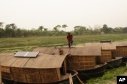 Filmmaker Glenn Baker envisions entire communities that will one day have to float as they adapt to climate change.