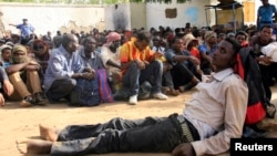 Katie Hensler looks over a sunflower field in Lawrence, Kansas, Sept. 7, 2016. The 40-acre field, planted annually by the Grinter family, draws thousands during the week-long late summer blossoming of the flowers.