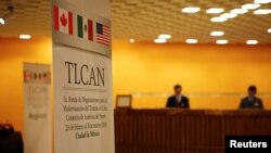 A NAFTA banner is seen at a hotel where the seventh round of NAFTA talks involving the United States, Mexico and Canada takes place, in Mexico City, Feb. 26, 2018. 