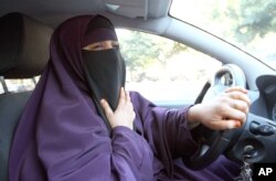 FILE – A ban on veils is one issue addressed by the UDMF party.