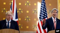 Menteri Luar Negeri AS John Kerry dan Menteri Luar Negeri Inggris Boris Johnson dalam konferensi pers gabungan di London (19/7). 