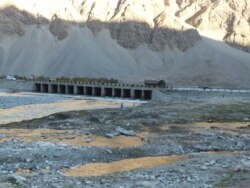 Army vehicles are seen on the way to Leh in the Himalayan region of Ladakh, India.