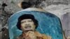 Gadhafi Buried in Secret Grave in Libyan Desert