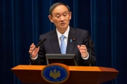 PM Jepang, Yoshihide Suga dalam konferensi pers di Tokyo, Jepang, 5 Maret 2021. (Yuichi Yamazaki/Pool via AP)