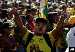Protesters in support of former president Jacob Zuma protest outside the High Court in Durban, South Africa, April 6, 2018.